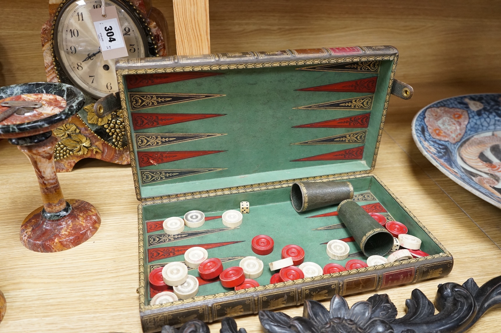 A backgammon games box, Sorrento box, a red wax seal mounted lid and a carved oak floral appliqué, 65cm wide (4)